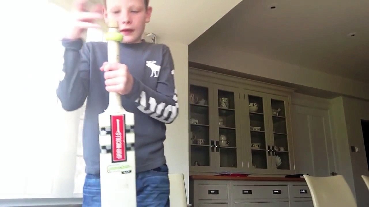 How to put a grip on a cricket bat using a cone