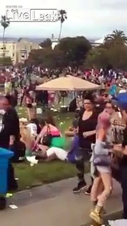 Couple having some fun and pleasure during music festival in front of people