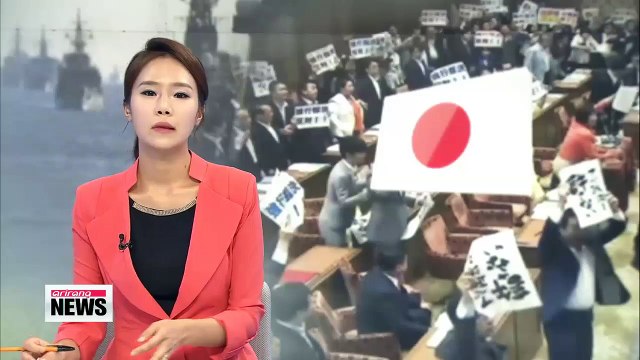 Lower house approves Japanese PM Abe's controversial security bills