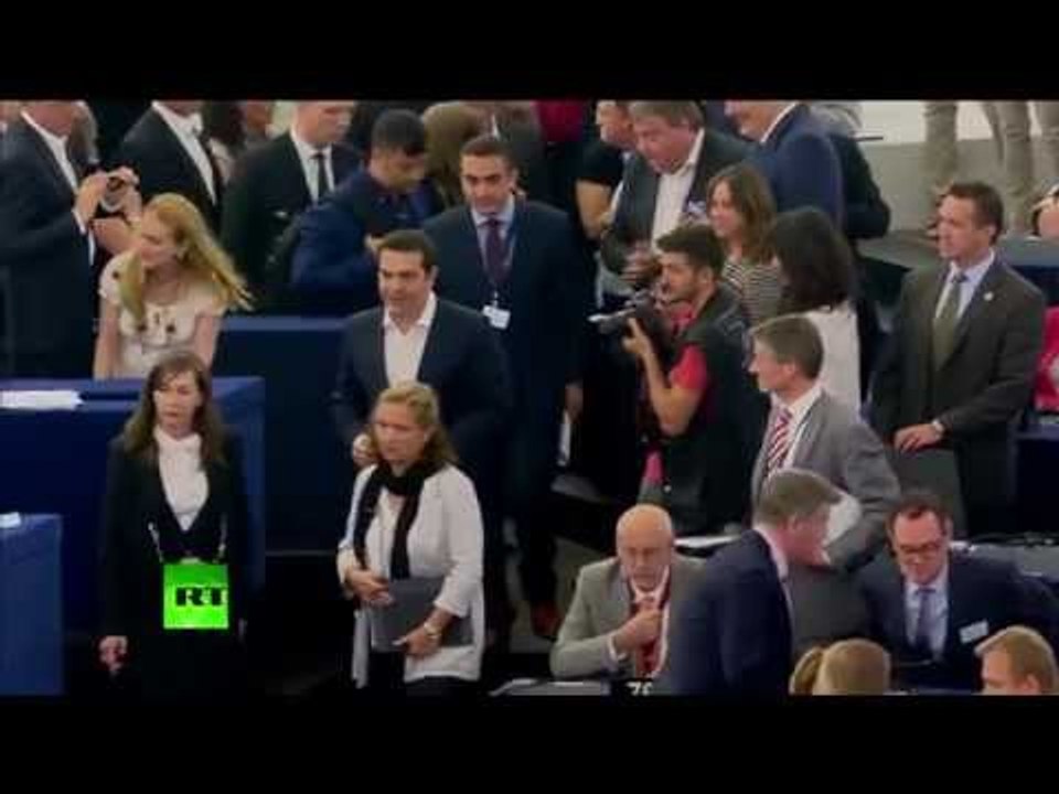 Applause & Booing: Moment Tsipras walks into European Parliament