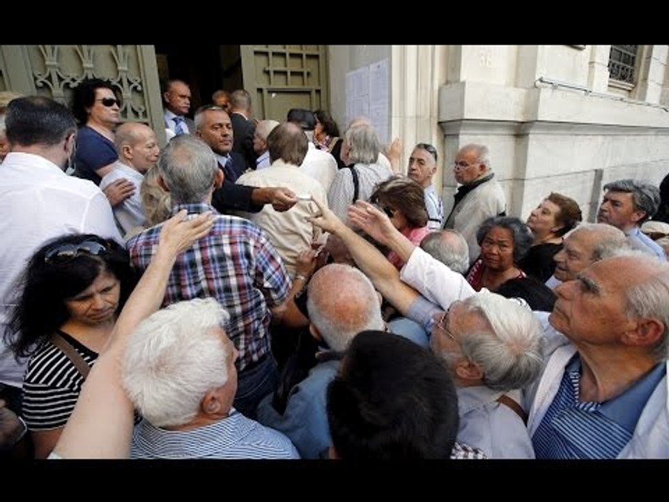 RAW: Greek pensioners besiege banks, scuffles break out