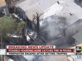 Possible hoarding home catches fire in Peoria