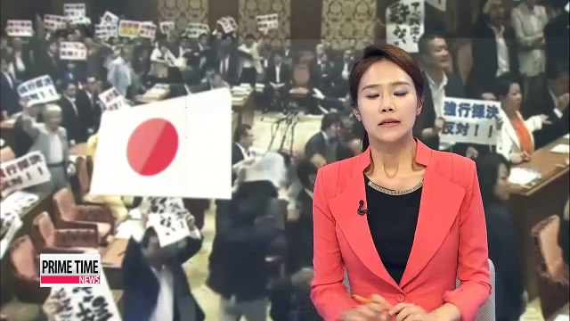 Lower house approves Japanese PM Abe's controversial security bills