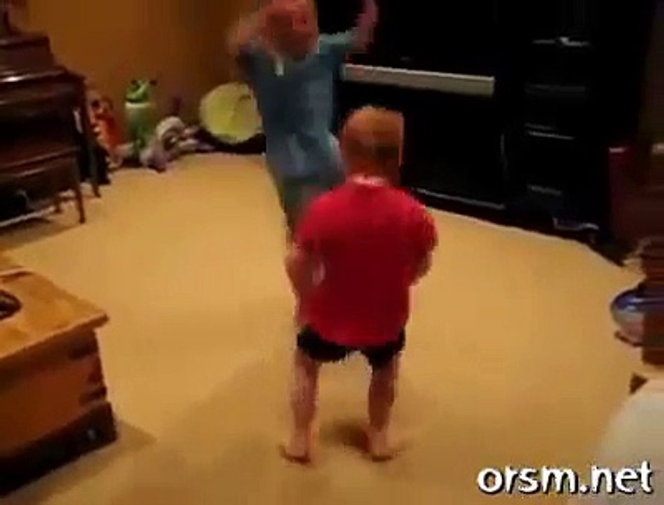 Dancing boy in the red shirt