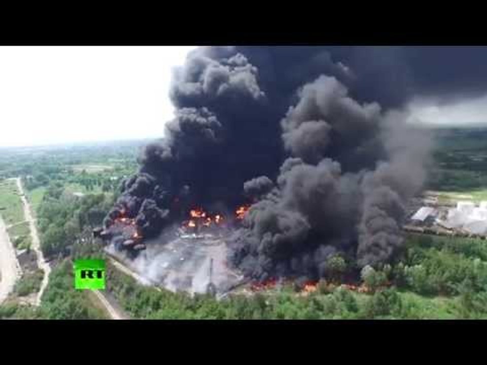 Aerial footage: Huge plumes of black smoke billow from burning oil depot near Kiev