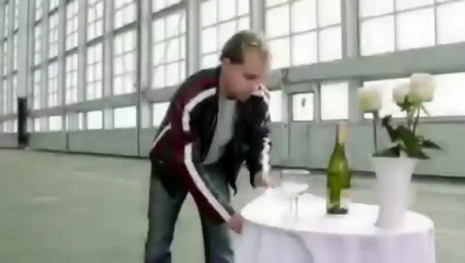 BMW motorcycle stunt pulls tablecloth