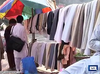 Dunya News - Muzaffarabad: People shop for Eid