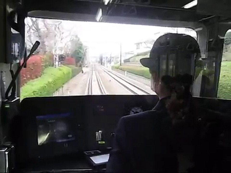 woman driver of train 井の頭線の女性運転士と子鉄くん