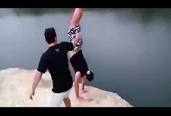 Polish idiot nearly kills his friend by pushing him off a cliff