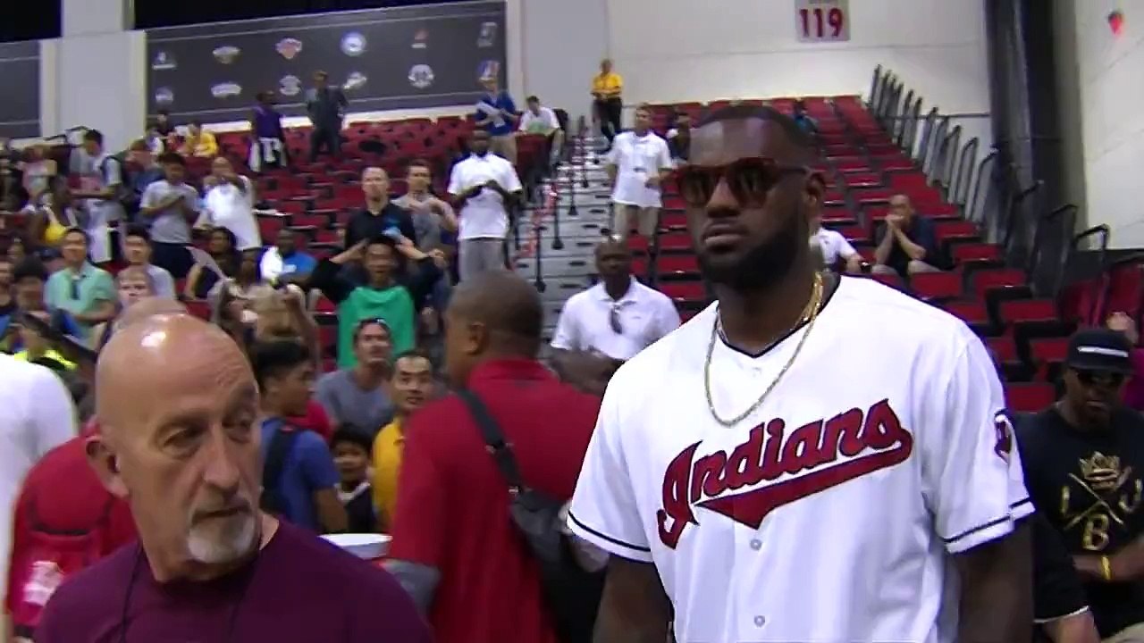 LeBron James Hits Seated Sideline Shot