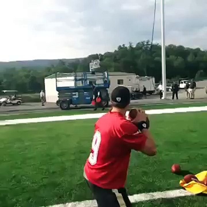 Drew Brees hits frisbee in midair with football