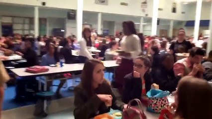 Marine brother surprises his little sister.