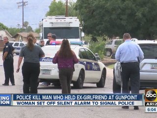 Suspect shot by police after holding ex-girlfriend hostage, exchanging gunfire with police