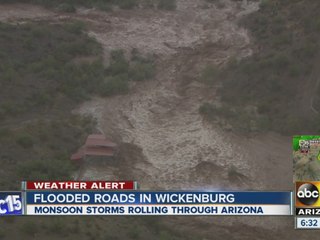 Flooded waters going through Wickenburg, AZ Saturday evening