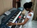 little girl playing old song piano