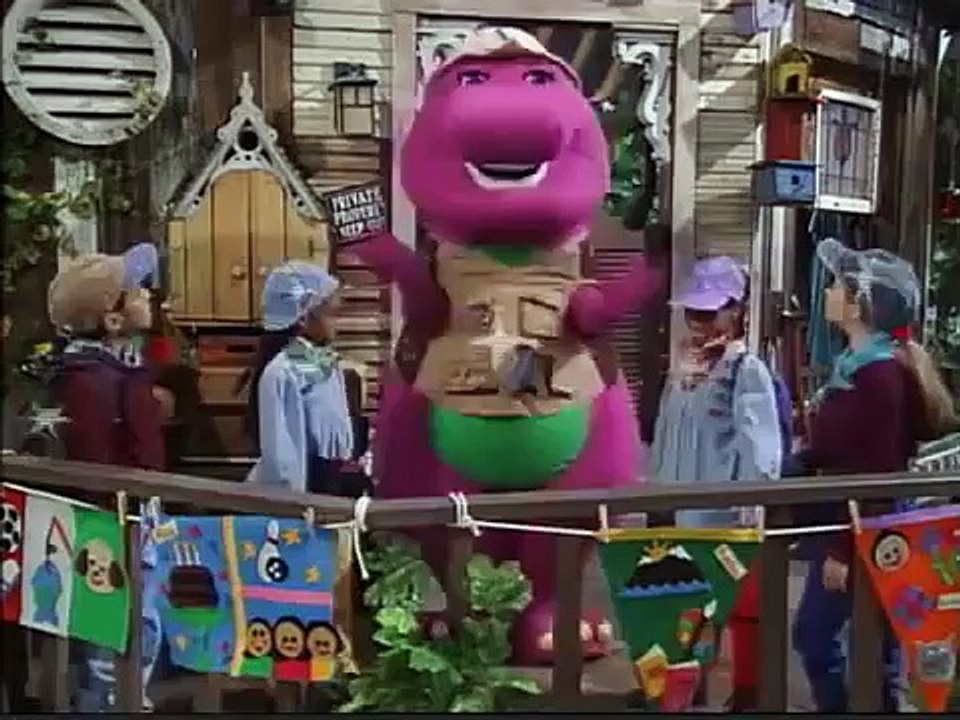 Barney and kids is wearing camping clothes!