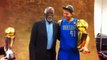Dirk Nowitzki poses with the Larry O'Brien trophy, MVP trophy & Bill Russell