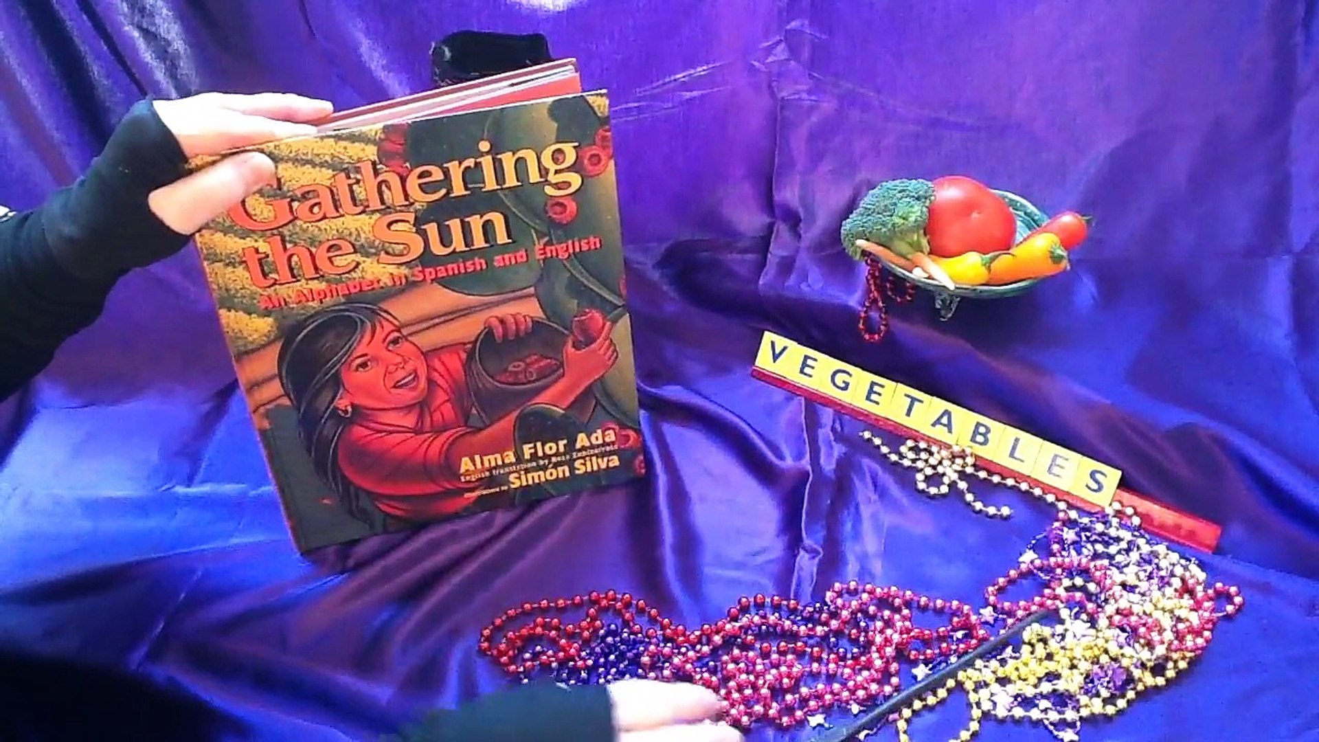 Gathering the Sun: an Alphabet in Spanish and English