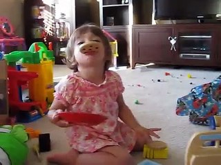 Analia and Tony playing with presents again June 29, 2009