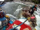 Woman gets stuck under whitewater in rapids while rafting!