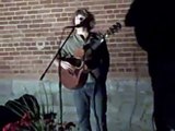 Acoustic Guitarist performing Bob Dylan classic 