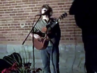 Acoustic Guitarist performing Bob Dylan classic "Wagon Wheel"