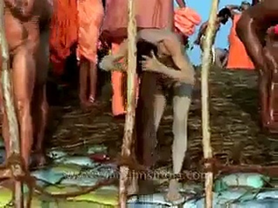 Naga sadhus on the banks of river Ganga during Ardh Kumbh Mela in 2007 By Daily Fun