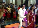 Bride and groom dancing on mehndi