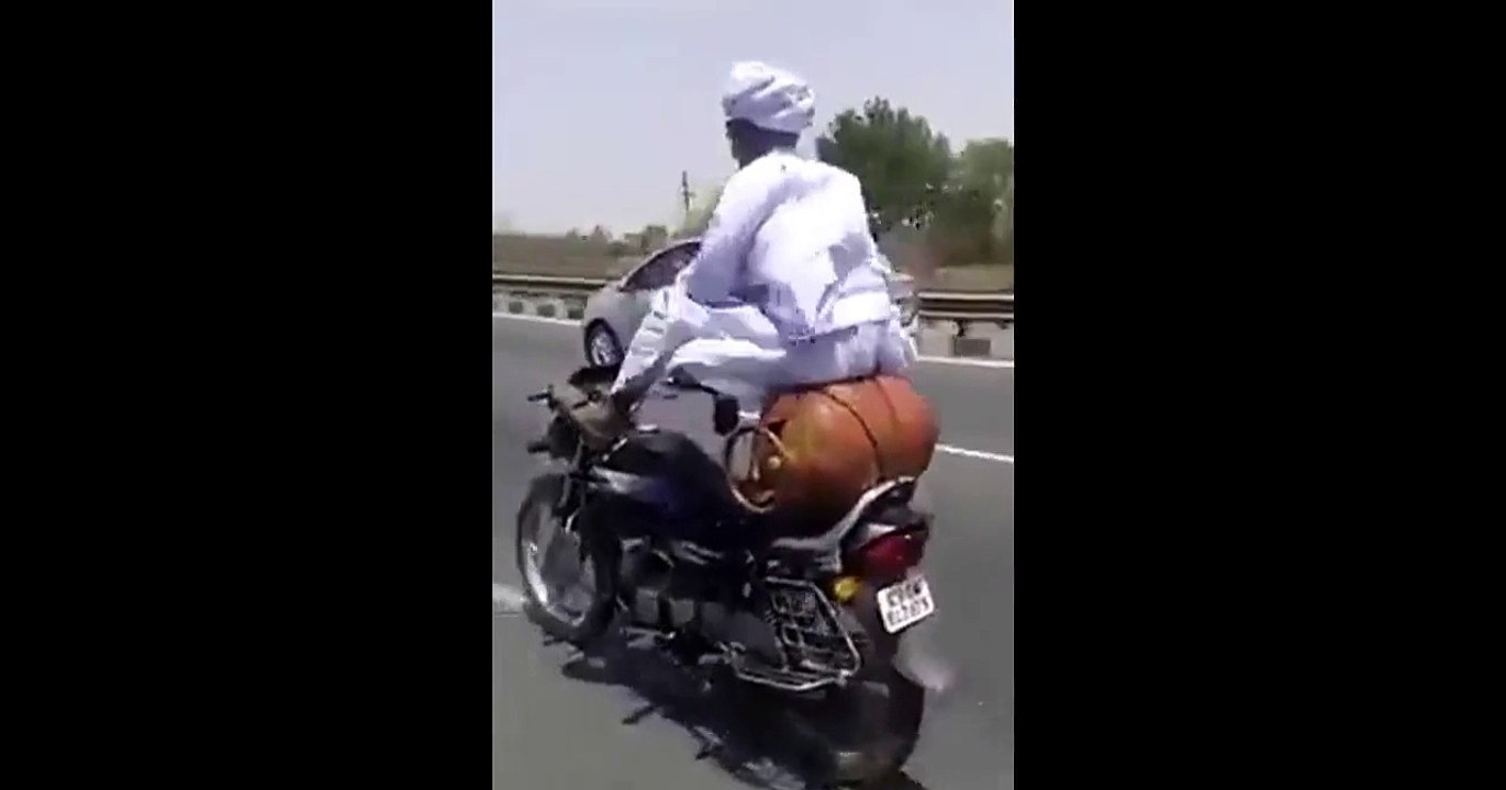 Indian man on a motorcycle
