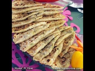 صفيحة علي الصاج - منال العالم