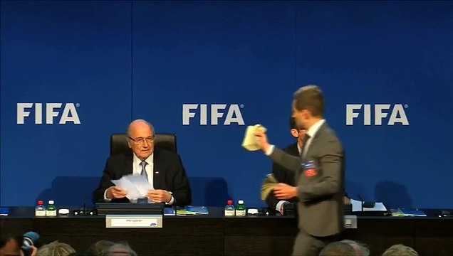 Prankster showers Sepp Blatter in fake bank notes