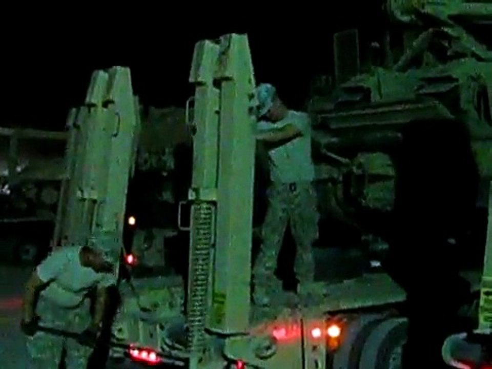 Offloading an M88 Hercules from a M1070 HET and M1000 Trailer