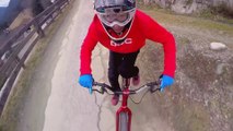 Guy rides his bike standing on the handlebars and performs other tricks!
