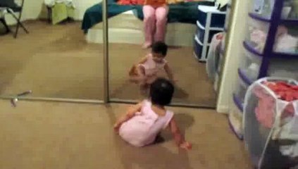 Kid on her reflection