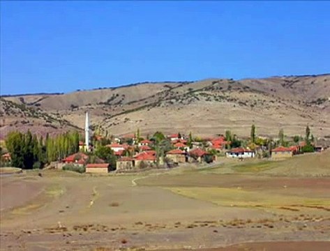 Gülşen kutlu yüce dağ başında yağan kar İdim