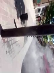 vaporisateur public dans une rue piétonne à Agen (France)