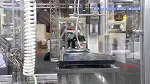 Filling glass vials in isolator with a Kawasaki MSR05N Robot