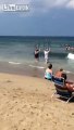 LiveLeakcom - Couple at the beach use anti-shark cages to take a dip in the sea