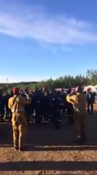 South African Firefighters singing while assisting wildland firefighters from Alberta, Canada