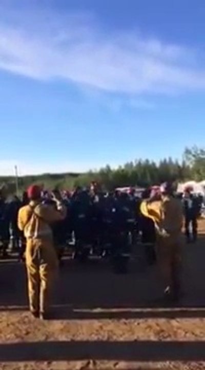 South African Firefighters singing while assisting wildland firefighters from Alberta, Canada