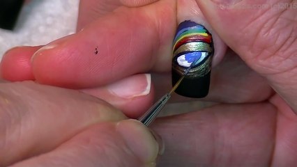 Water Drop Nail Design Featuring Rainbow Eyes and Teardrops