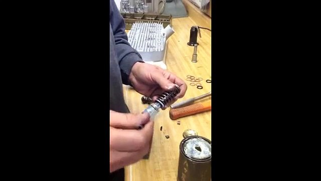 Installing and adjusting new valves in a Ford flathead V-8