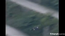 Amazing wingsuit stuntman Jeb Corliss soars through China mountains
