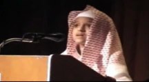 a kid reciting beautifuly  طفل يتلو القرآن