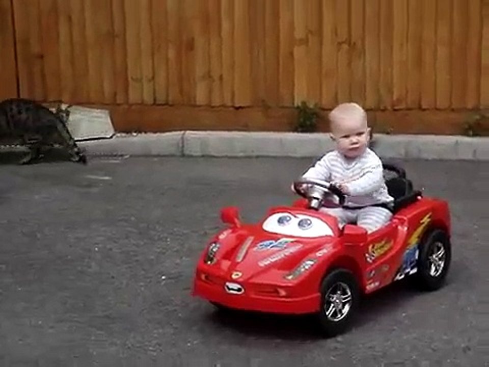 Amazing 7 month old baby driving car