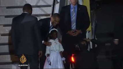 Obama lands in Kenya to euphoric welcome