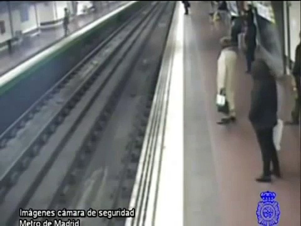 Man (almost) run over by train. Hero saves his life.
