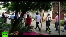 Dramatic Rescue_ Newborn baby pulled from sewage pipes in China
