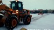 PRIES, INC. - Case & John Deere wheel loaders plowing snow