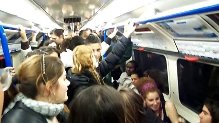 Flirty girls on the London tube during rush hour